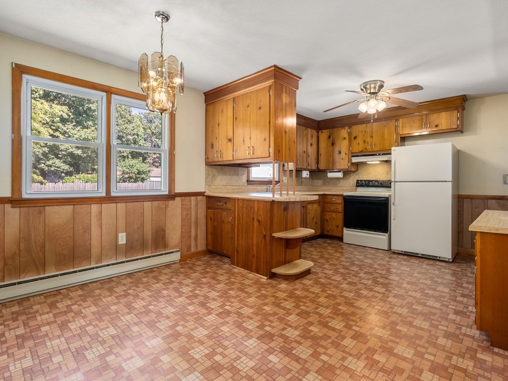 16 May Road Ludlow, MA 01056 - Photo 5 of 28 a kitchen with refrigerator and window