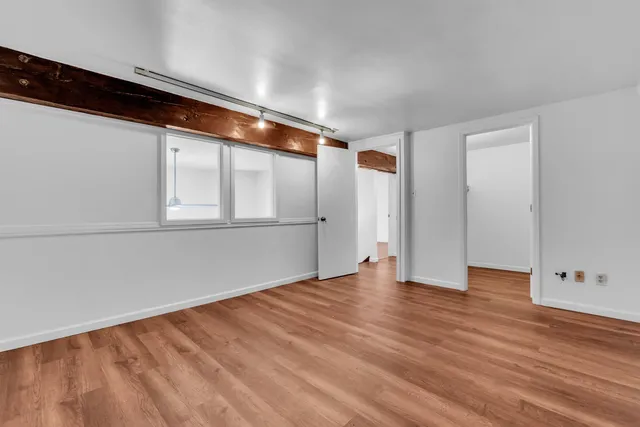 a view of small space with racks on the wall