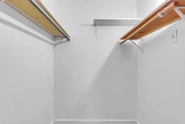 a view of a pathway with a wall