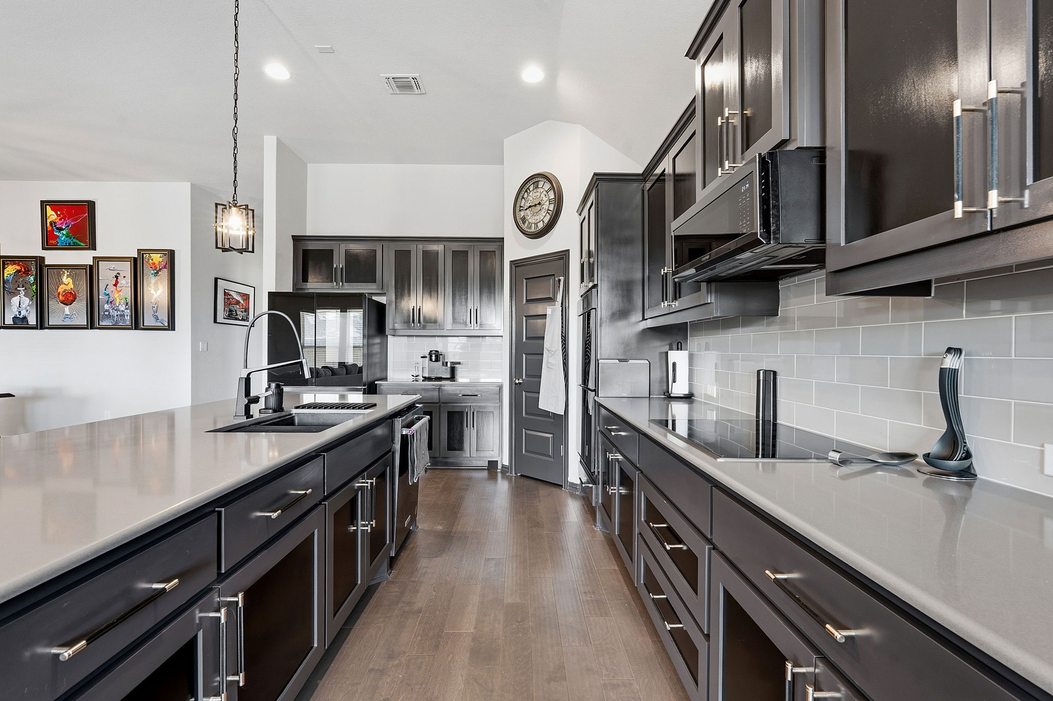 12616 Twisted Root Drive Manchaca, TX 78652 - Photo 11 of 36 Quartz countertops pair perfectly with the subway tile backsplash.