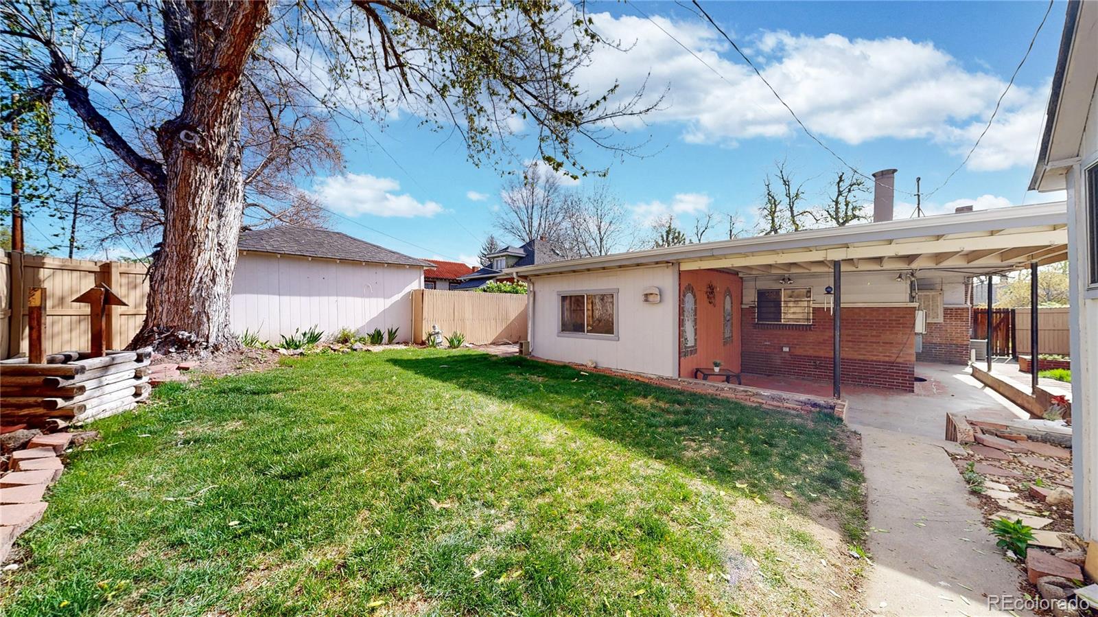 4169 Hooker Street Denver, CO 80211 - Photo 41 of 48 a view of a house with backyard