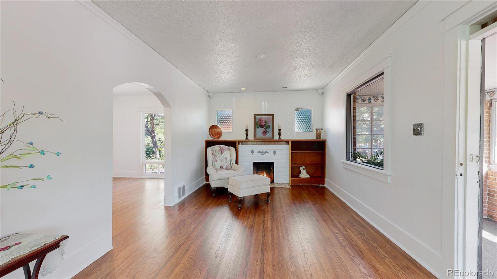 4169 Hooker Street Denver, CO 80211 - Photo 7 of 48 a living room with furniture and a wooden floor
