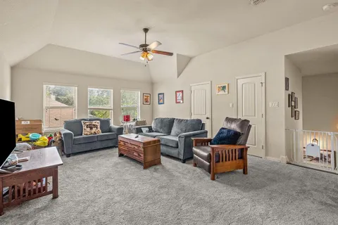 a living room with furniture and a couch