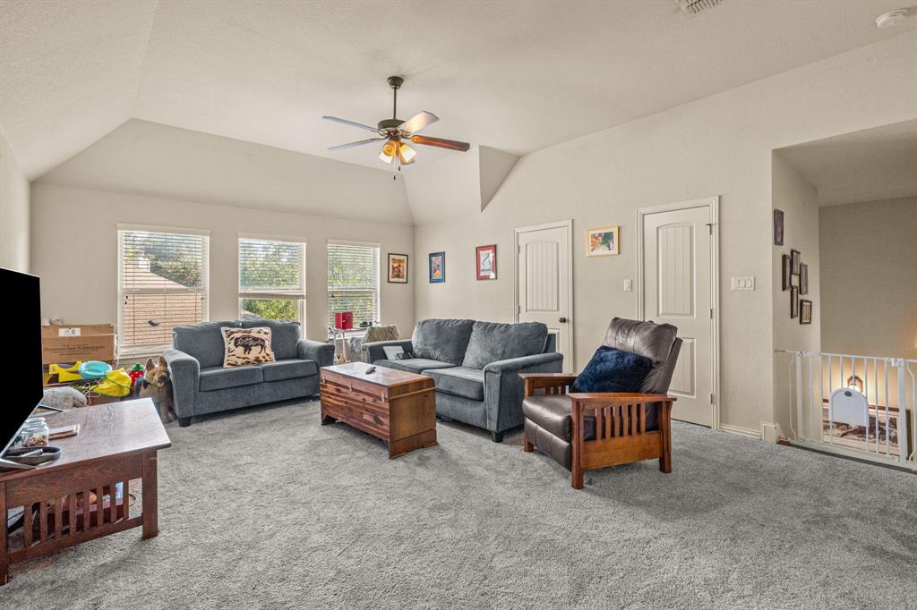 108 Bosque Court Azle, TX 76020 - Photo 20 of 33 a living room with furniture and a couch