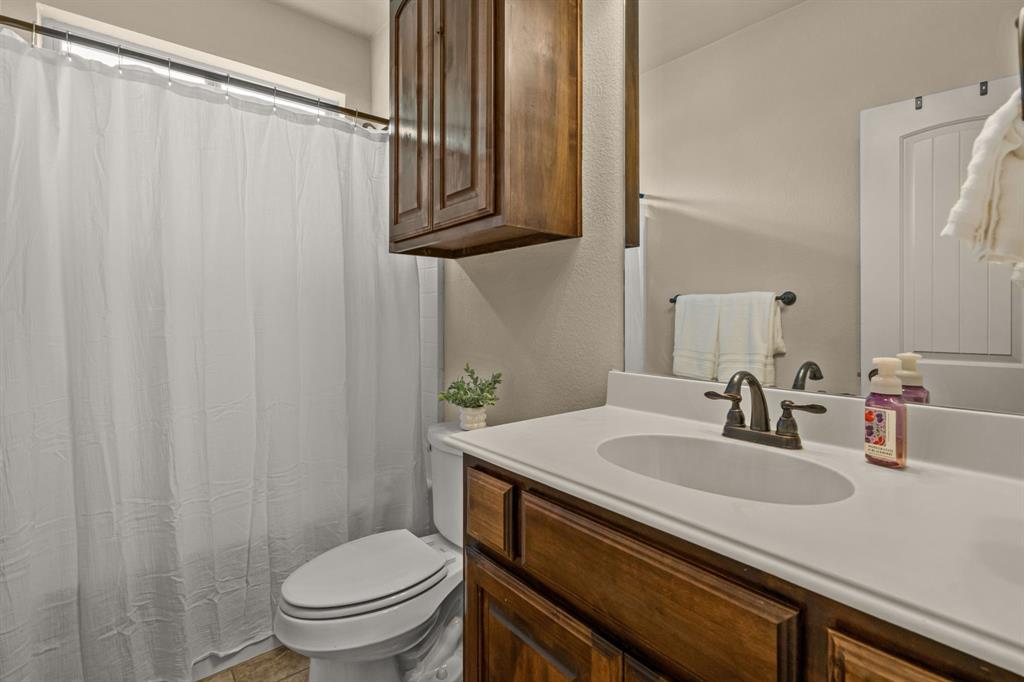108 Bosque Court Azle, TX 76020 - Photo 9 of 40 First floor guest bathroom