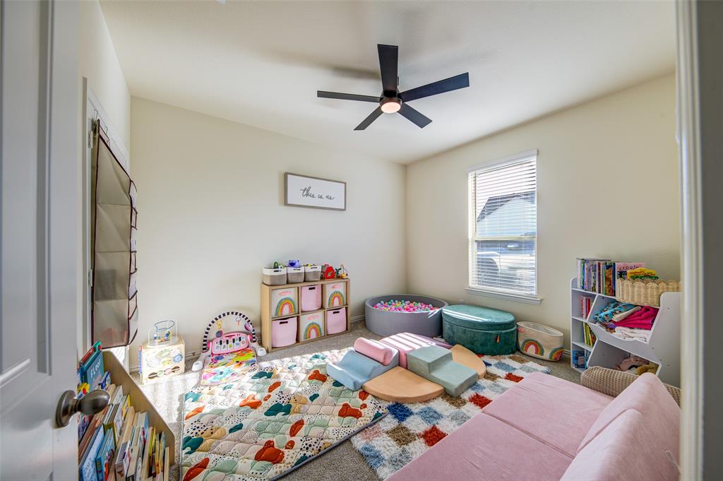 131 Clear Crk Lane Rhome, TX 76078 - Photo 16 of 29 Game room featuring ceiling fan and carpet