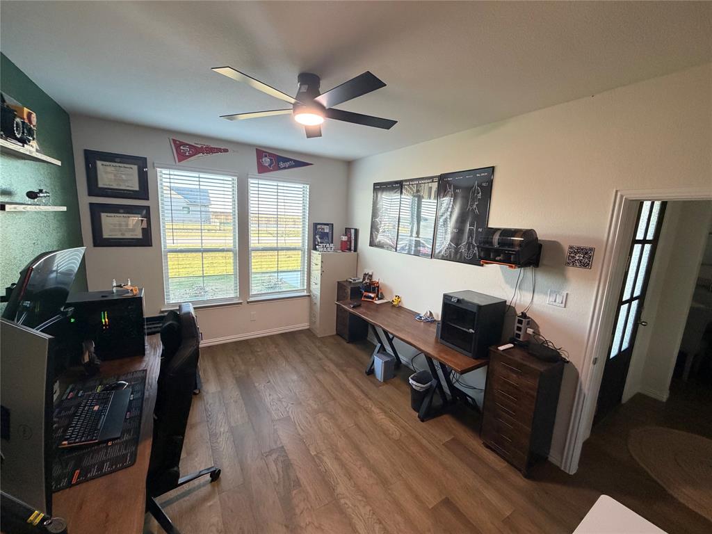 131 Clear Crk Lane Rhome, TX 76078 - Photo 29 of 29 Office area with dark wood finished floors and ceiling fan