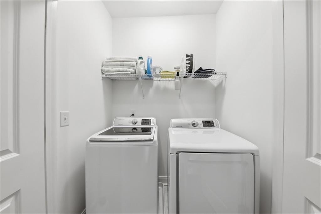 3193 Bartee Walk Suwanee, GA 30024 - Photo 13 of 27 a utility room with dryer and washer