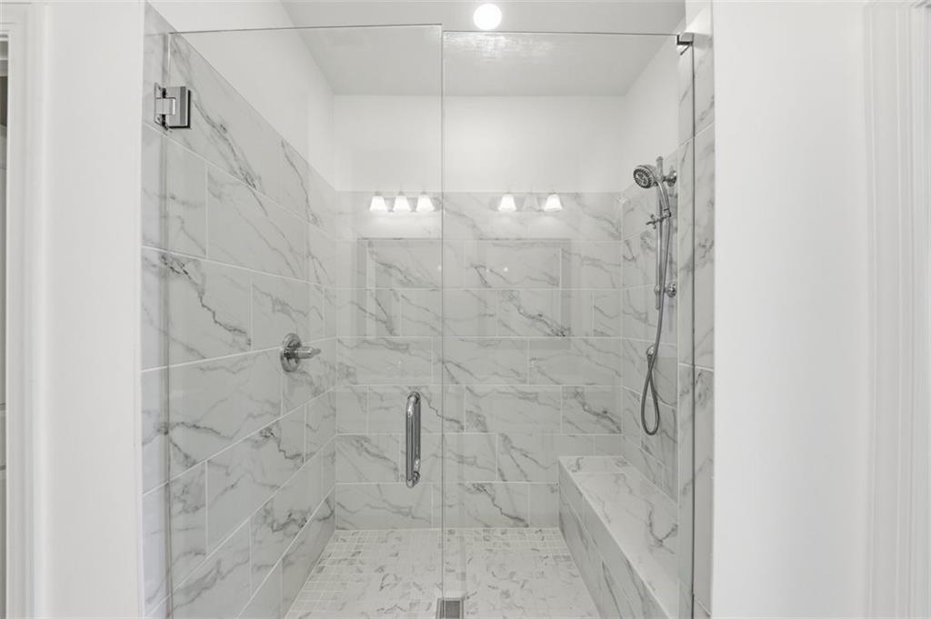 3193 Bartee Walk Suwanee, GA 30024 - Photo 17 of 27 a bathroom with a shower
