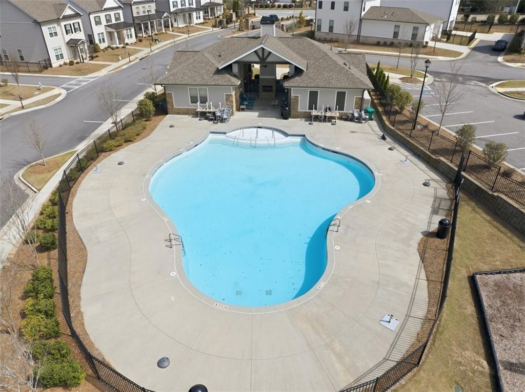 3193 Bartee Walk Suwanee, GA 30024 - Photo 26 of 27 an aerial view of a house with swimming pool