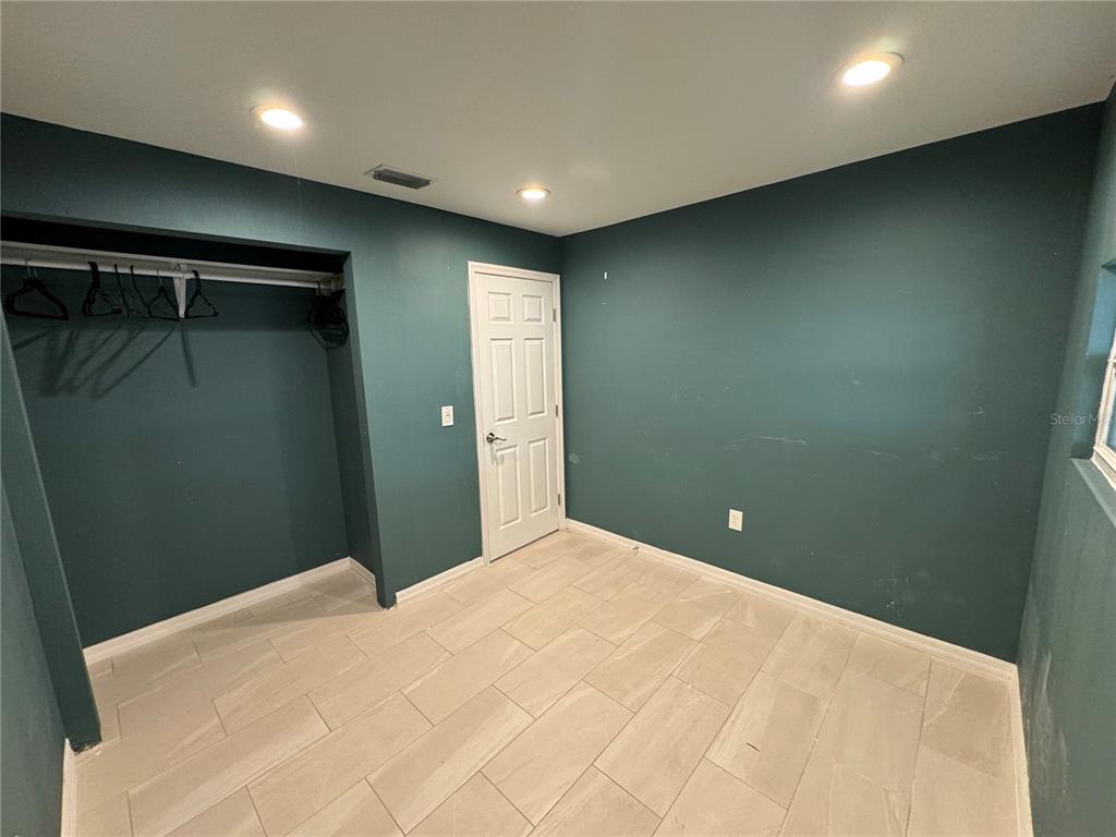 7102 Reindeer Road Tampa, FL 33619 - Photo 12 of 25 a view of empty room