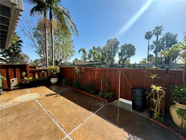 a view of a backyard with sitting area