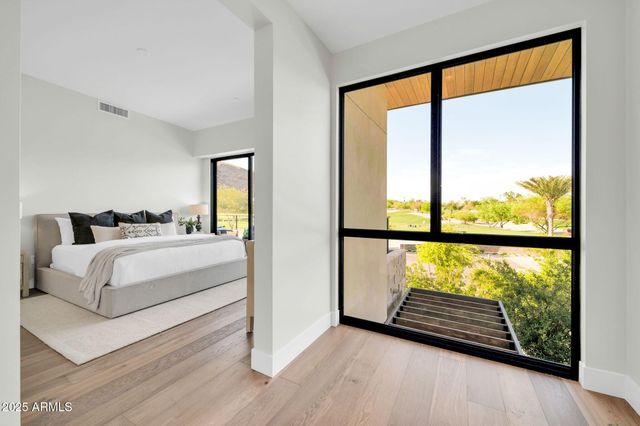 a view of a balcony with lake view and a ocean view