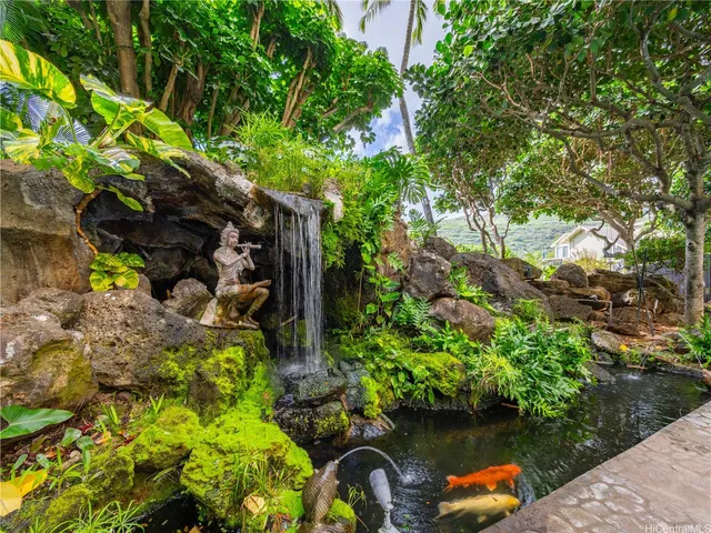 a backyard of a house with lots of green space