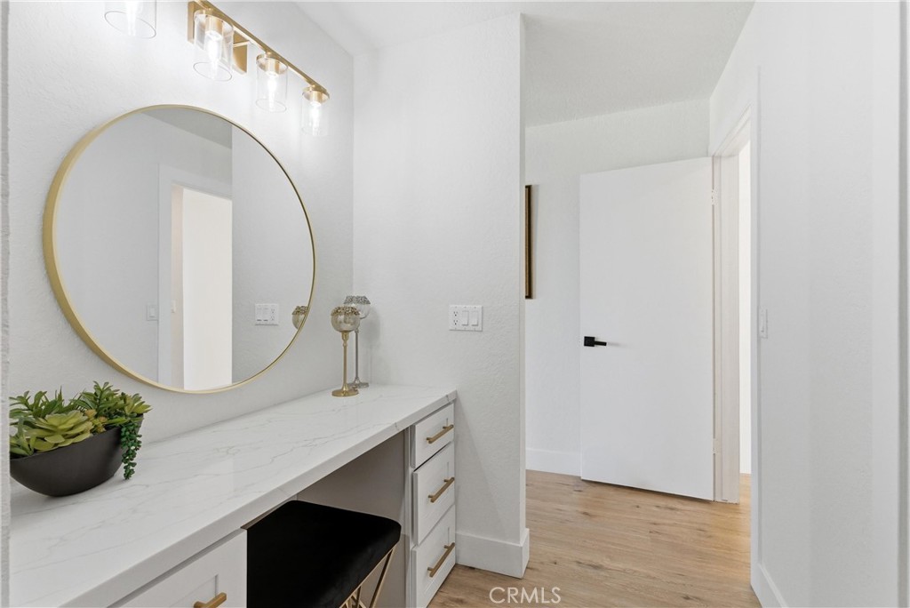 23281 Atlantis Way Dana Point, CA 92629 - Photo 39 of 81 a bathroom with a sink and a mirror