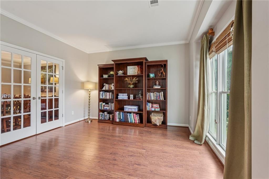 3820 Ridge Point Drive Suwanee, GA 30024 - Photo 19 of 41 a view of a livingroom with furniture and wooden floor