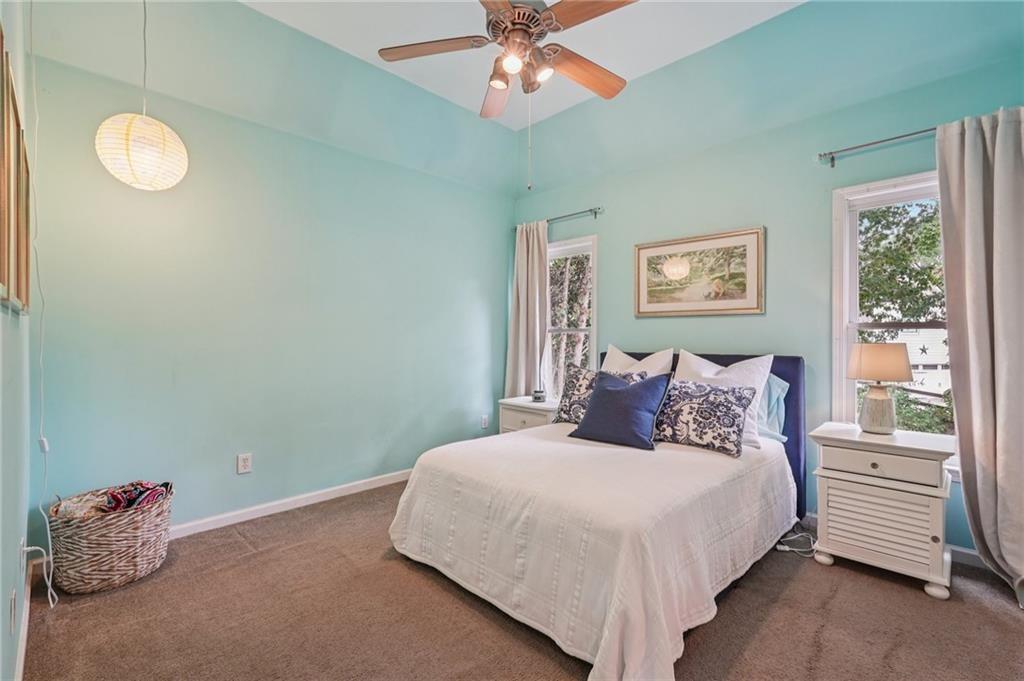 3820 Ridge Point Drive Suwanee, GA 30024 - Photo 35 of 41 a bedroom with a bed and a window