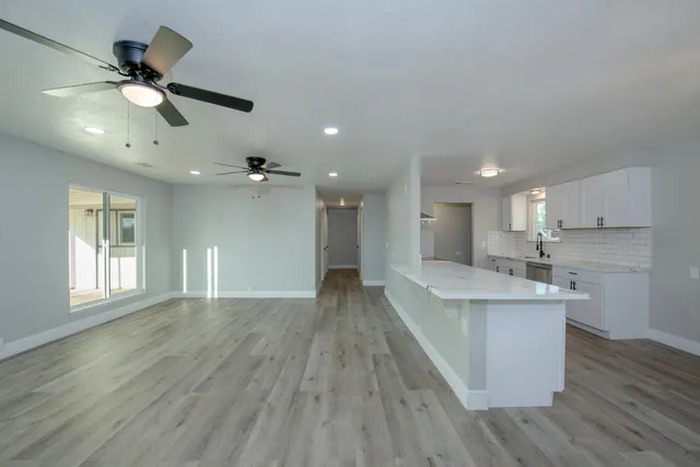 a view of kitchen and windows