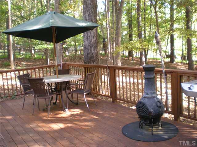 3417 Hackney Court Raleigh, NC 27613 - Photo 21 of 23 View of spacious deck overlooking secluded, natural backyard setting. Enjoy nature's beauty while relaxing or entertaining friends & family. Horse/walking trails adjoin the rear lot area. Patio/Deck