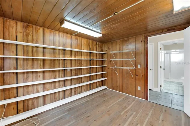 a view of storage and utility room with closet