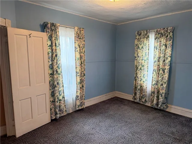 a bathroom with a tub and shower