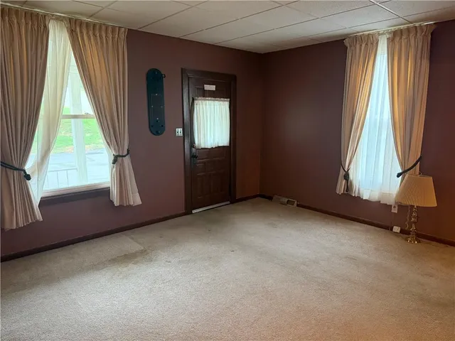 an empty room with windows