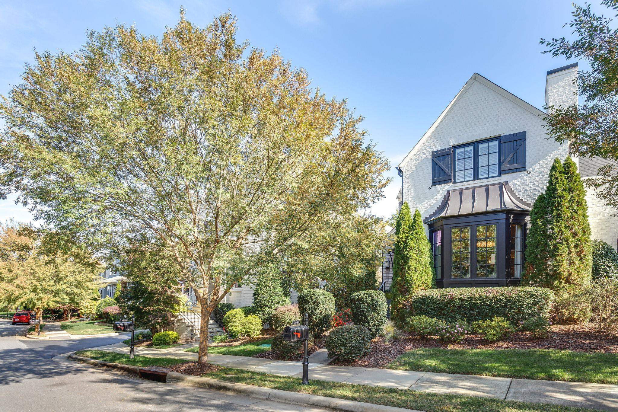 2008 Vinnings Place Raleigh, NC 27608 - Photo 1 of 55 a front view of a house with a yard