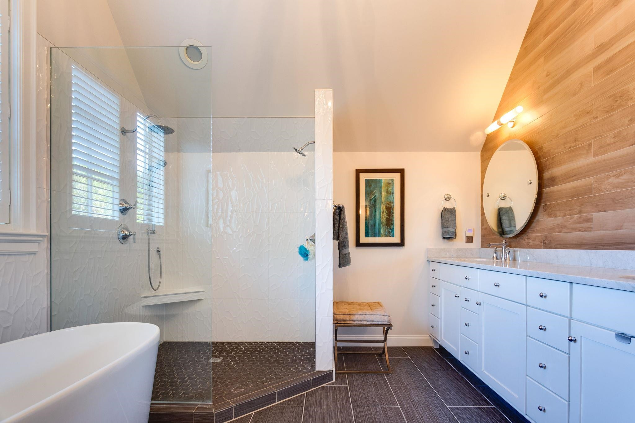 2008 Vinnings Place Raleigh, NC 27608 - Photo 32 of 55 a bathroom with a bathtub a sink and a mirror