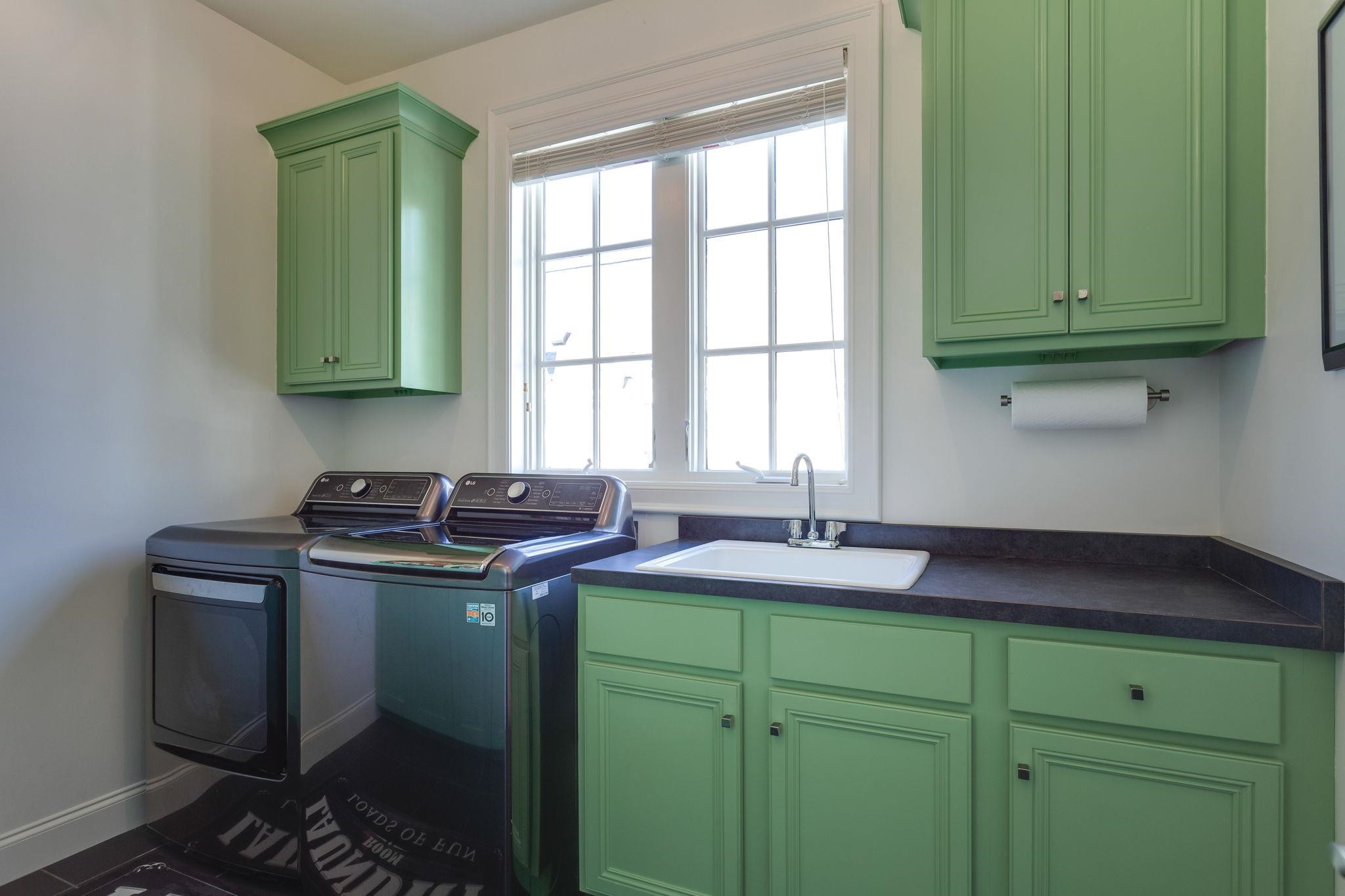 2008 Vinnings Place Raleigh, NC 27608 - Photo 38 of 55 a kitchen with sink and cabinets