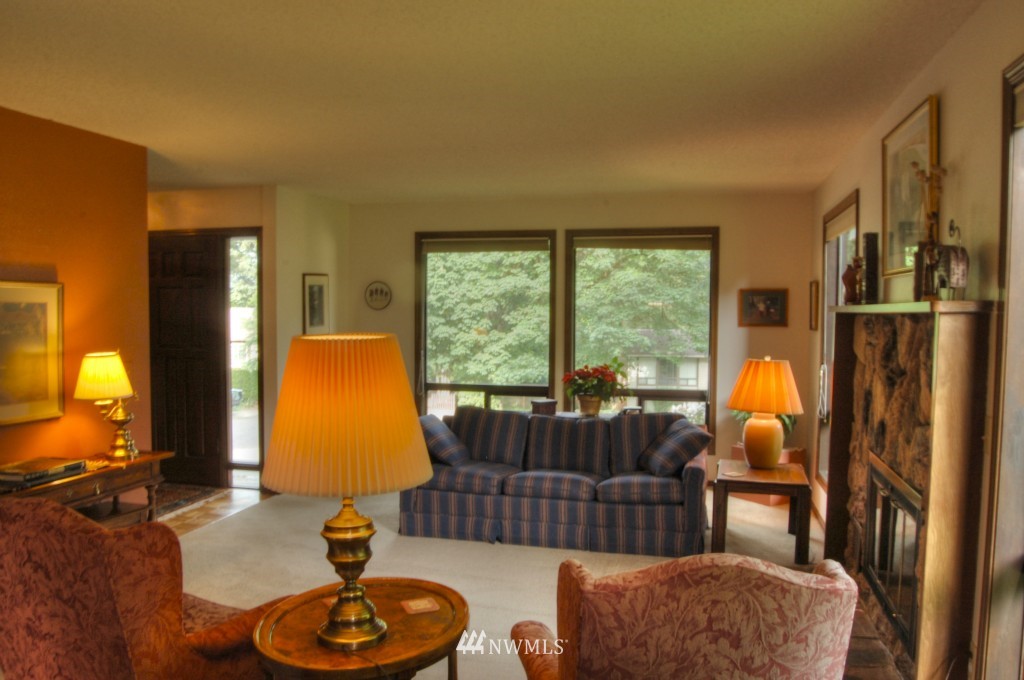 18731 129th Court Northeast Bothell, WA 98011 - Photo 15 of 24 a living room with furniture and a window
