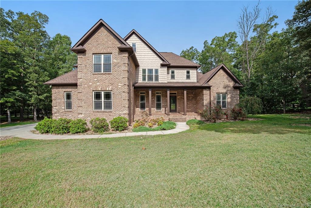 5415 Unionville Road Monroe, NC 28110 - Photo 1 of 40 a front view of a house with a yard