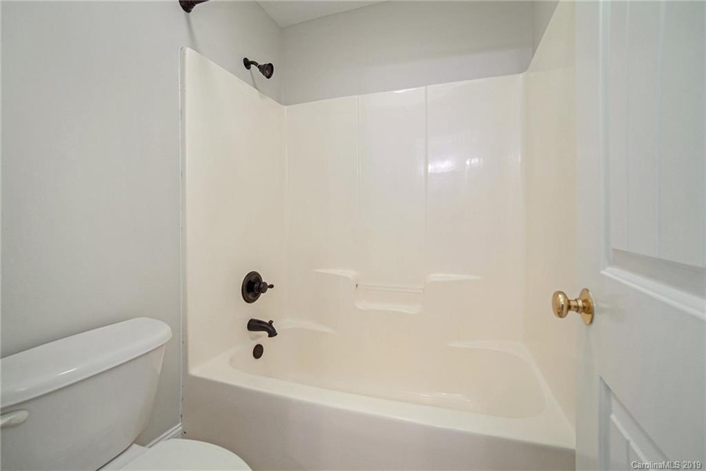5415 Unionville Road Monroe, NC 28110 - Photo 19 of 40 a bathroom with a bathtub