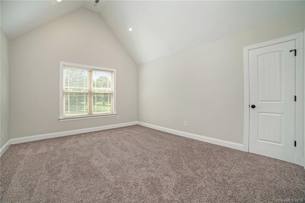 5415 Unionville Road Monroe, NC 28110 - Photo 20 of 40 an empty room with windows