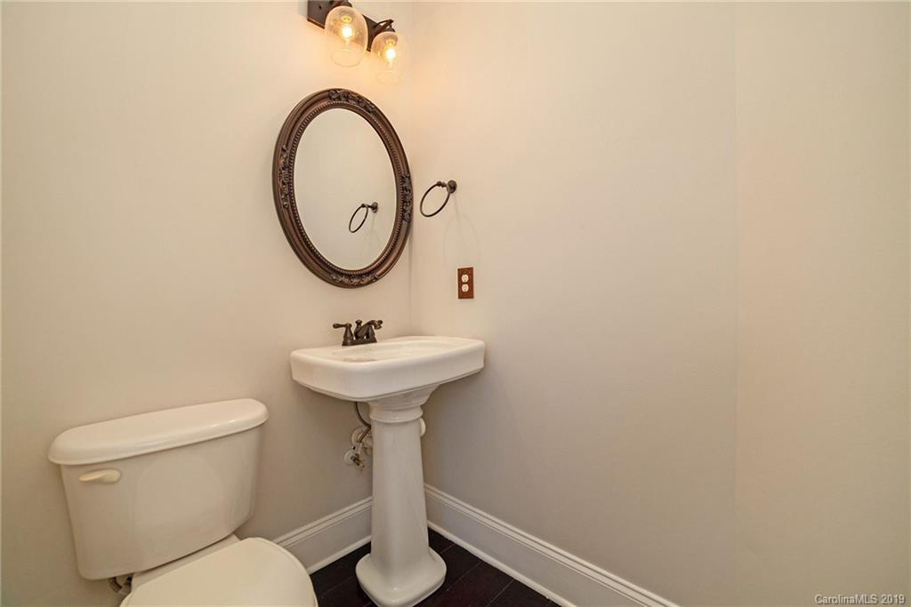 5415 Unionville Road Monroe, NC 28110 - Photo 22 of 40 a bathroom with a toilet sink and mirror