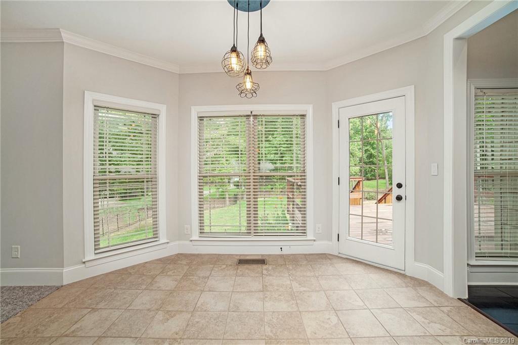 5415 Unionville Road Monroe, NC 28110 - Photo 6 of 40 a view of an empty room with a window
