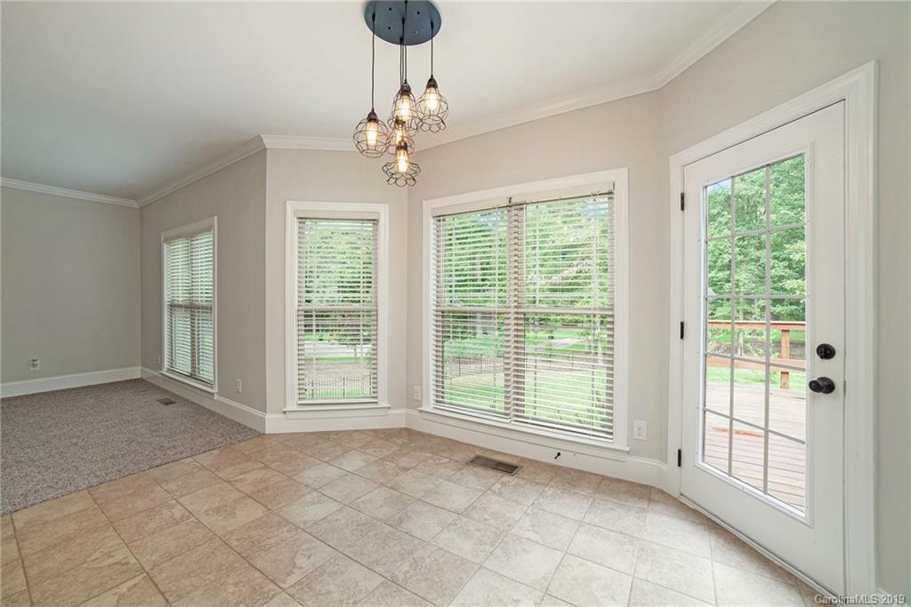 5415 Unionville Road Monroe, NC 28110 - Photo 7 of 40 a view of an empty room with a window