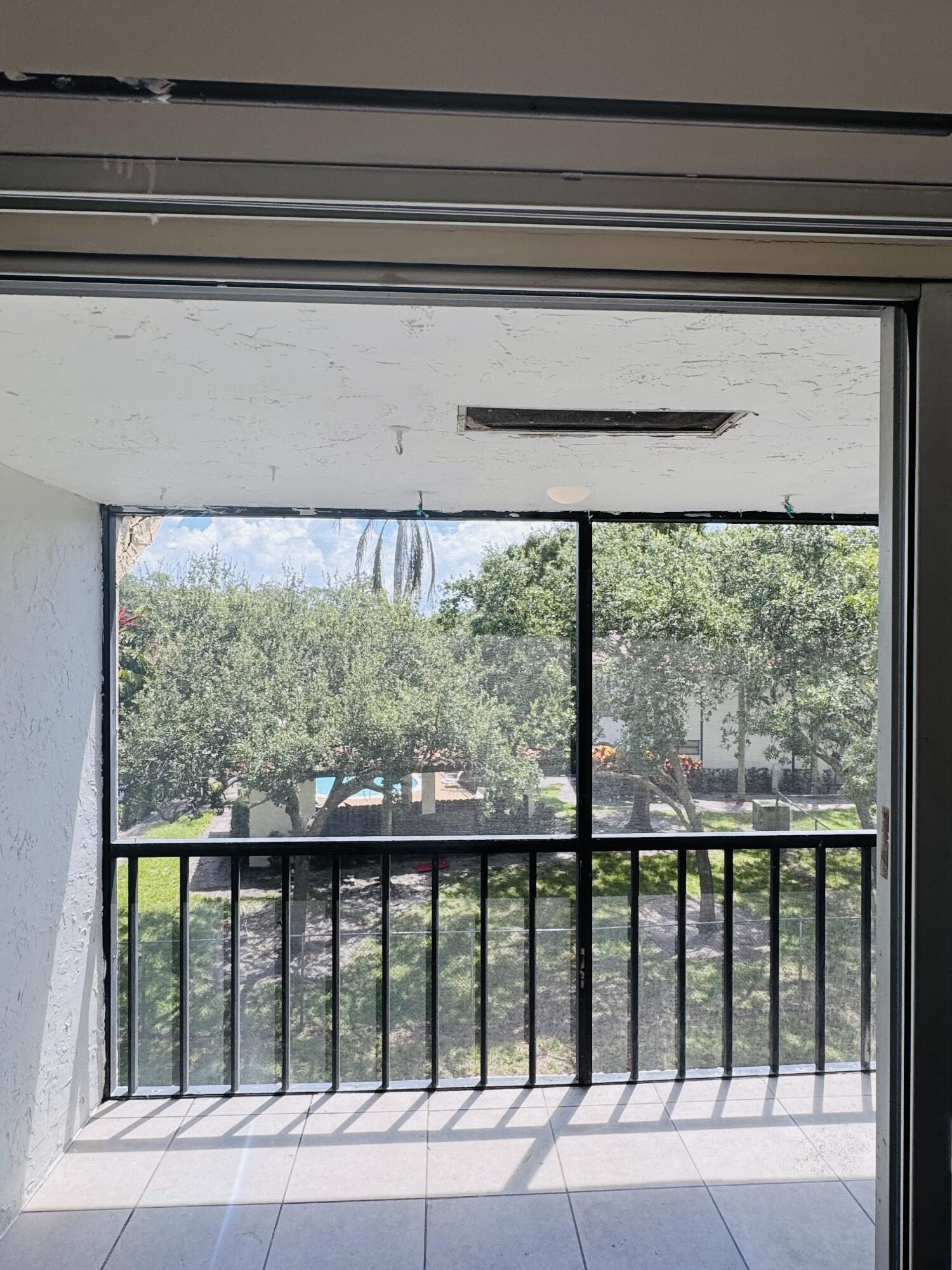 480 Northwest 20th Street, Unit 3020 Boca Raton, FL 33431 - Photo 4 of 16 Screened In Porch