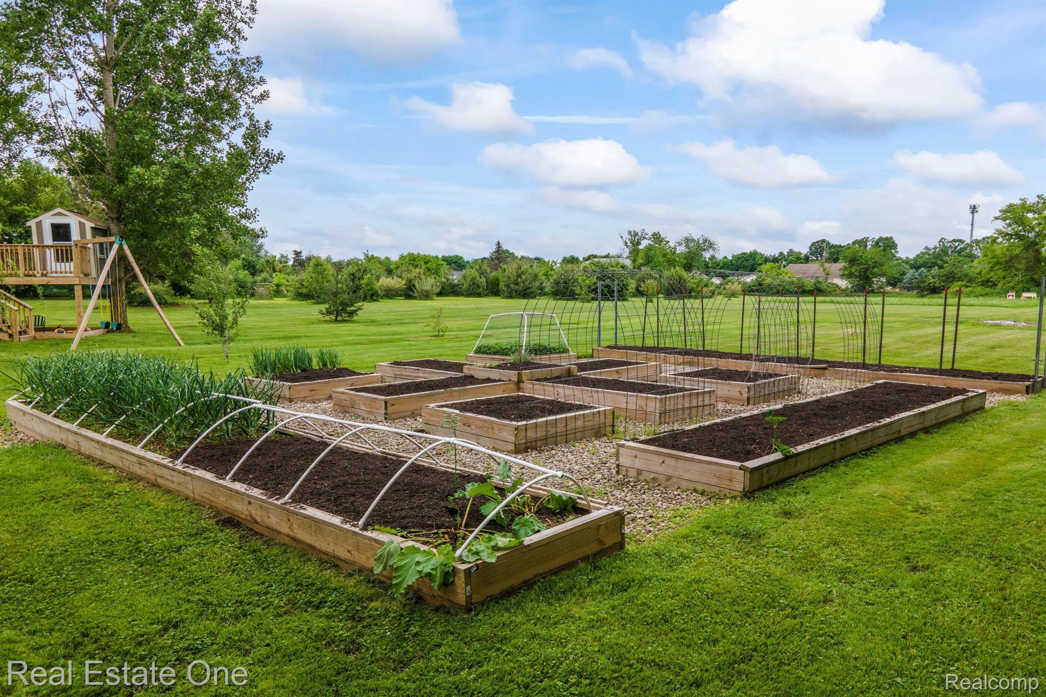 7448 Sharp Road Swartz Creek, MI 48473 - Photo 42 of 49 Large raised bed garden area