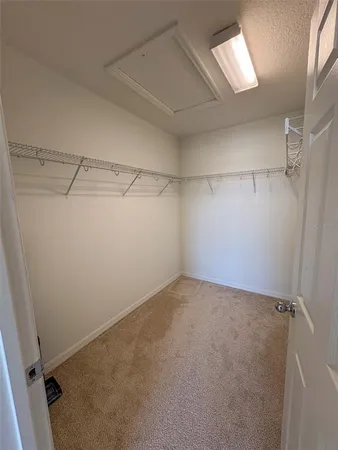 a view of a room with racks on the wall