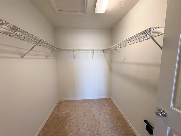 a view of a room with racks on the wall