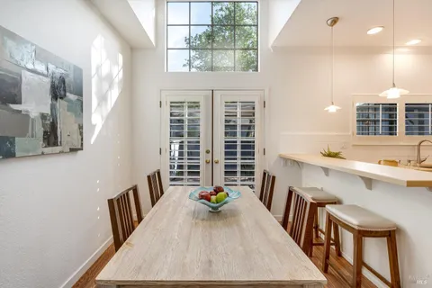 a view of a kitchen counter space and wooden floor