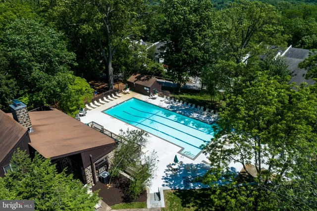 a aerial view of a house with a yard
