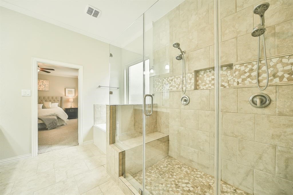 8510 Brinklow Point Drive Cypress, TX 77433 - Photo 19 of 46 a bathroom with a shower