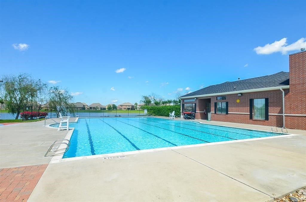 8510 Brinklow Point Drive Cypress, TX 77433 - Photo 46 of 46 a view of a house with a swimming pool