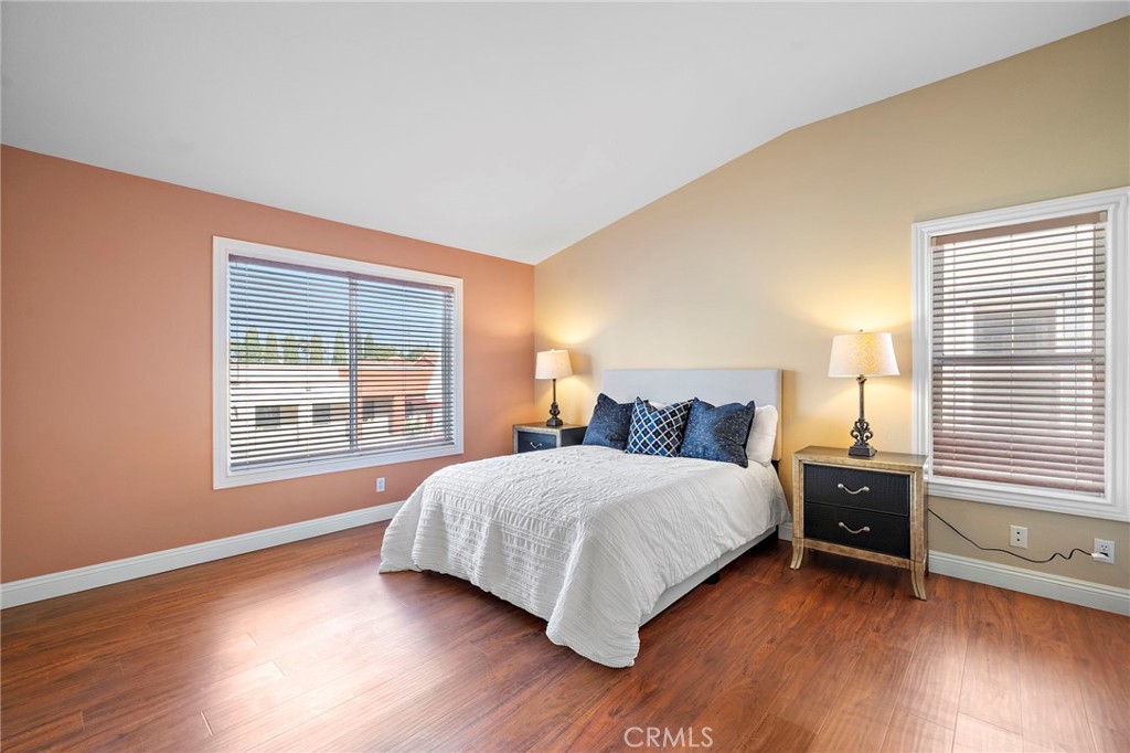 8971 Poinsettia Lane Garden Grove, CA 92841 - Photo 29 of 34 a bedroom with a bed and a window