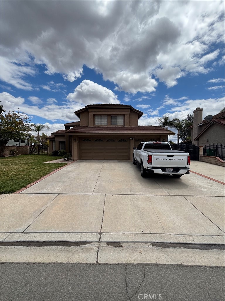 17092 Whispering Brook Way Riverside, CA 92503 - Photo 1 of 74 a car parked on the side of the road