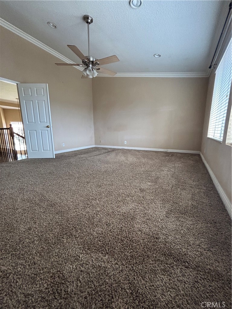 17092 Whispering Brook Way Riverside, CA 92503 - Photo 26 of 74 wooden floor in an empty room with a window