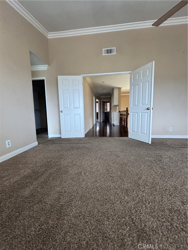 17092 Whispering Brook Way Riverside, CA 92503 - Photo 27 of 74 a view of a room with a hallway