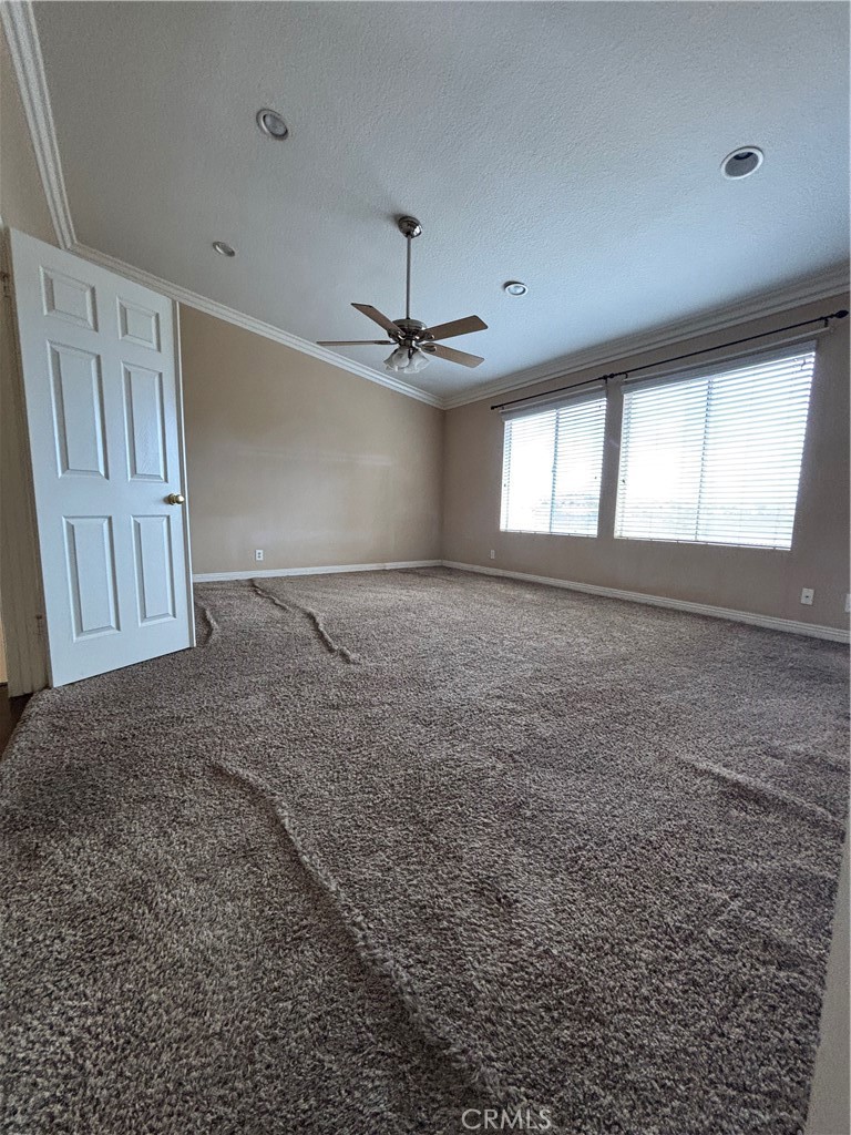 17092 Whispering Brook Way Riverside, CA 92503 - Photo 37 of 74 a view of an empty room with a window