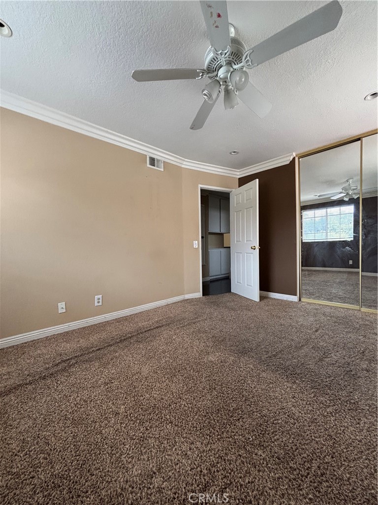 17092 Whispering Brook Way Riverside, CA 92503 - Photo 40 of 74 a view of an empty room with a window